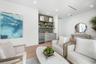 Second floor hosts a morning/evening bar and seating for a cozy conversation