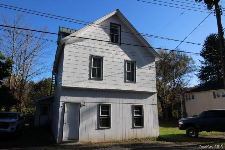 In the heart of the Hamlet of Livingston Manor sits this well maintained 2 unit Apartment house.
