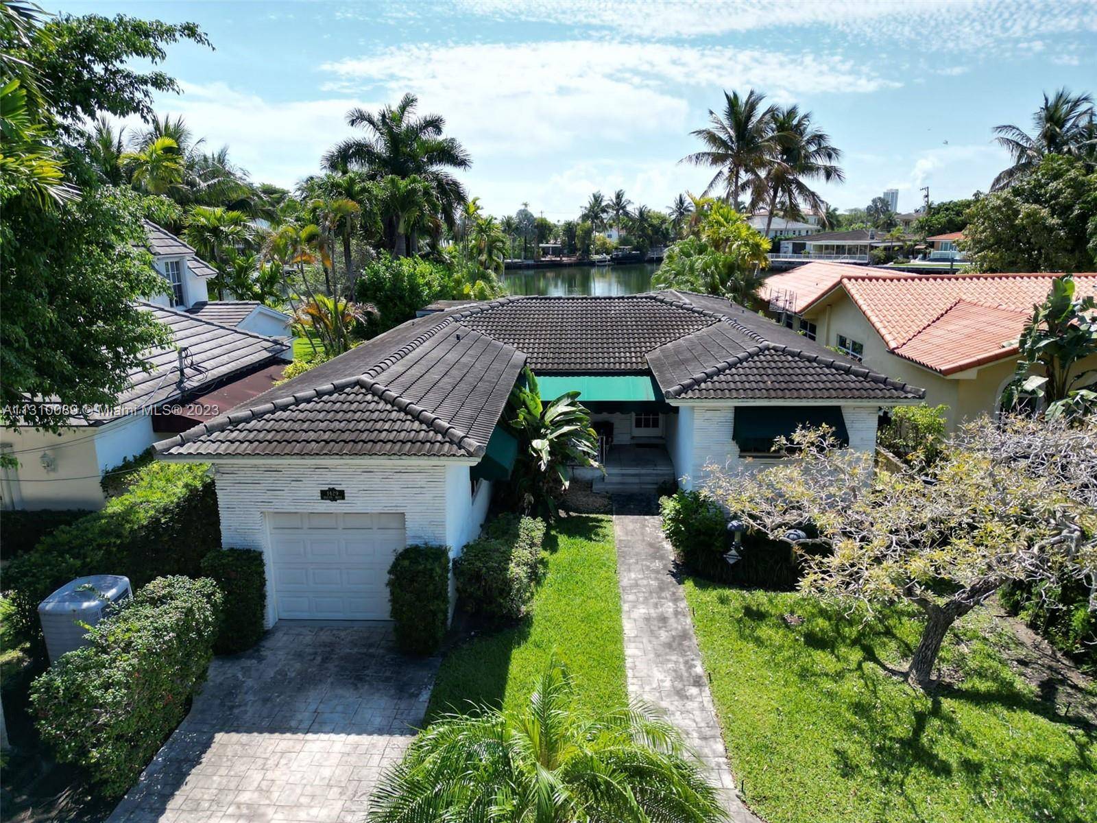 Repriced ! ! ! Rare Opportunity on Isle of Biscaya in Surfside 8, 000 SF lot with 50 LF of waterfront pool.