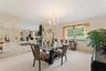 Reverse view of dining room looking back into the living room. Don't you just love those wrought iron room dividers!