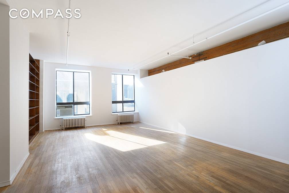 Spacious classic loft with one bedroom and office easily convertible to second bedroom.