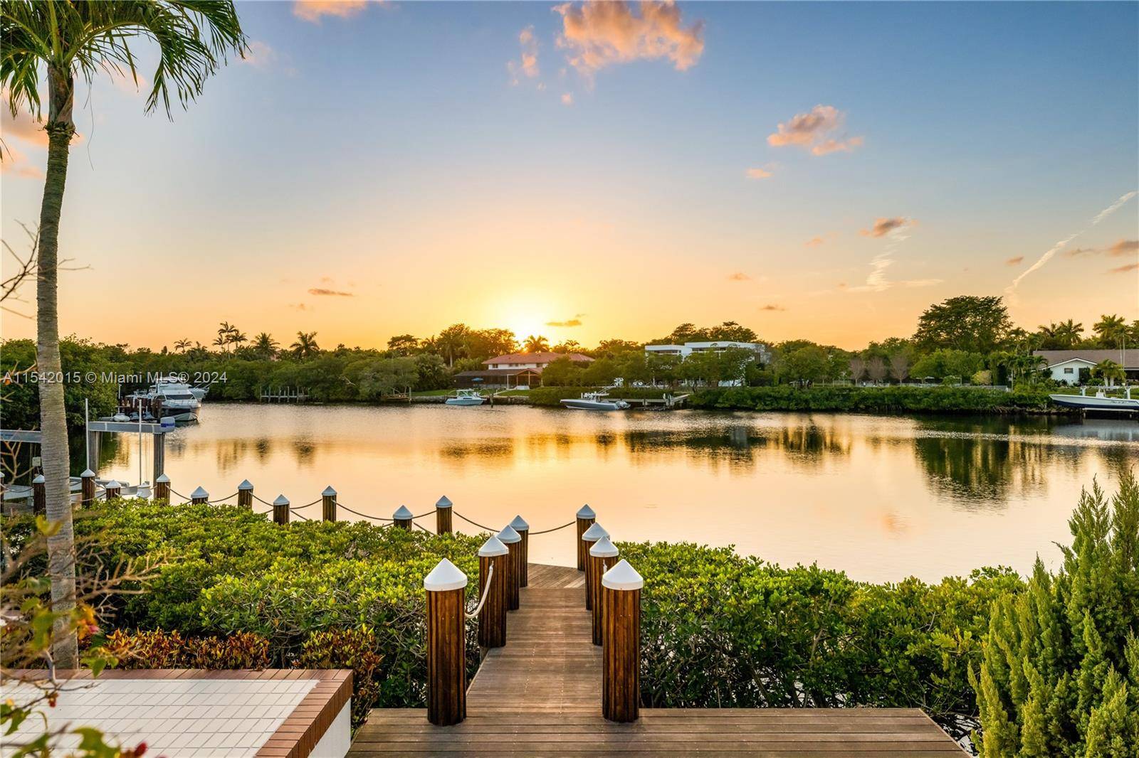 Be amazed by the breathtaking water views from this home with over 300 feet waterfront in Islands of Cocoplum.