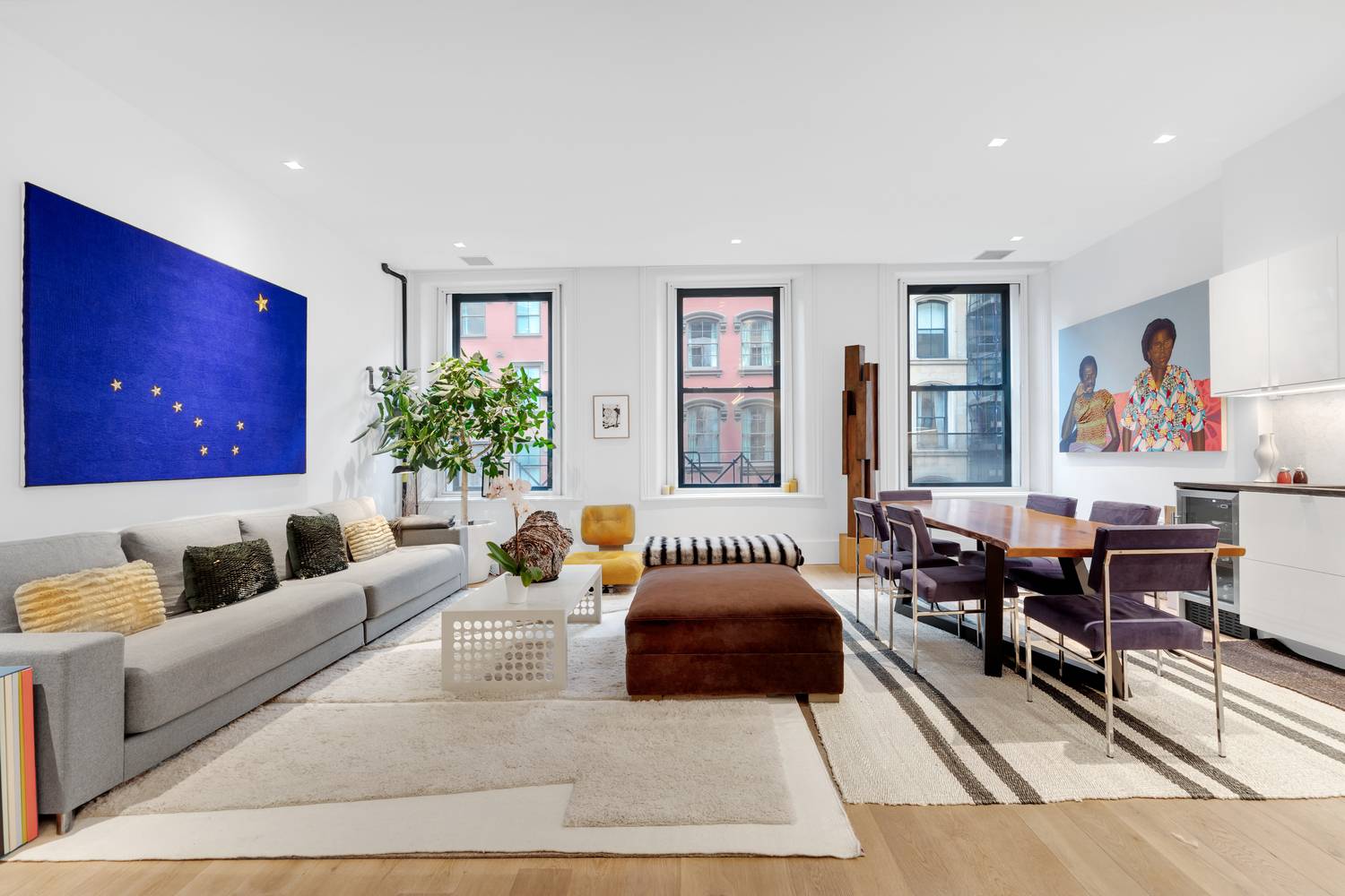 Contemporary finishes with sleek lines suffuse this gut renovated floor through co op in prime Tribeca, a 2 bedroom, 2 bathroom home that exemplifies modern luxury living.