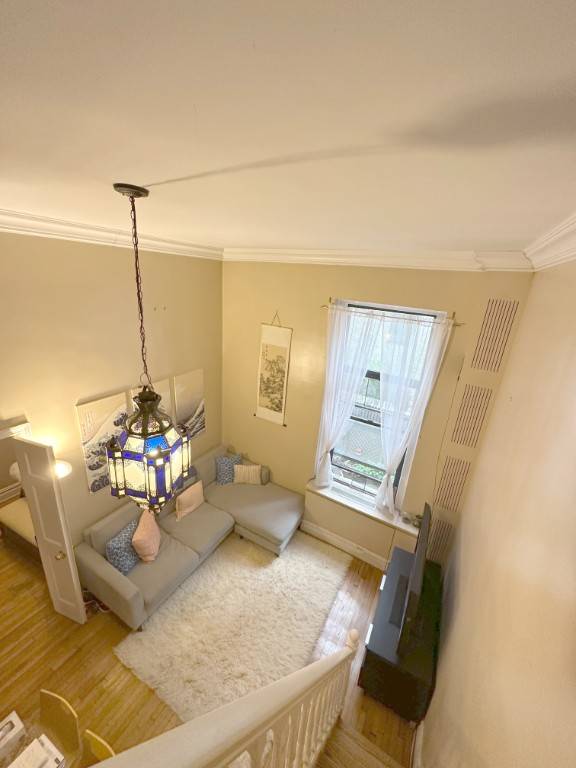 Welcome to this extraordinary One Bedroom Home Office Loft in a quintessential NYC Townhouse !