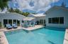 Plenty of lounging and seating in a private tropical setting