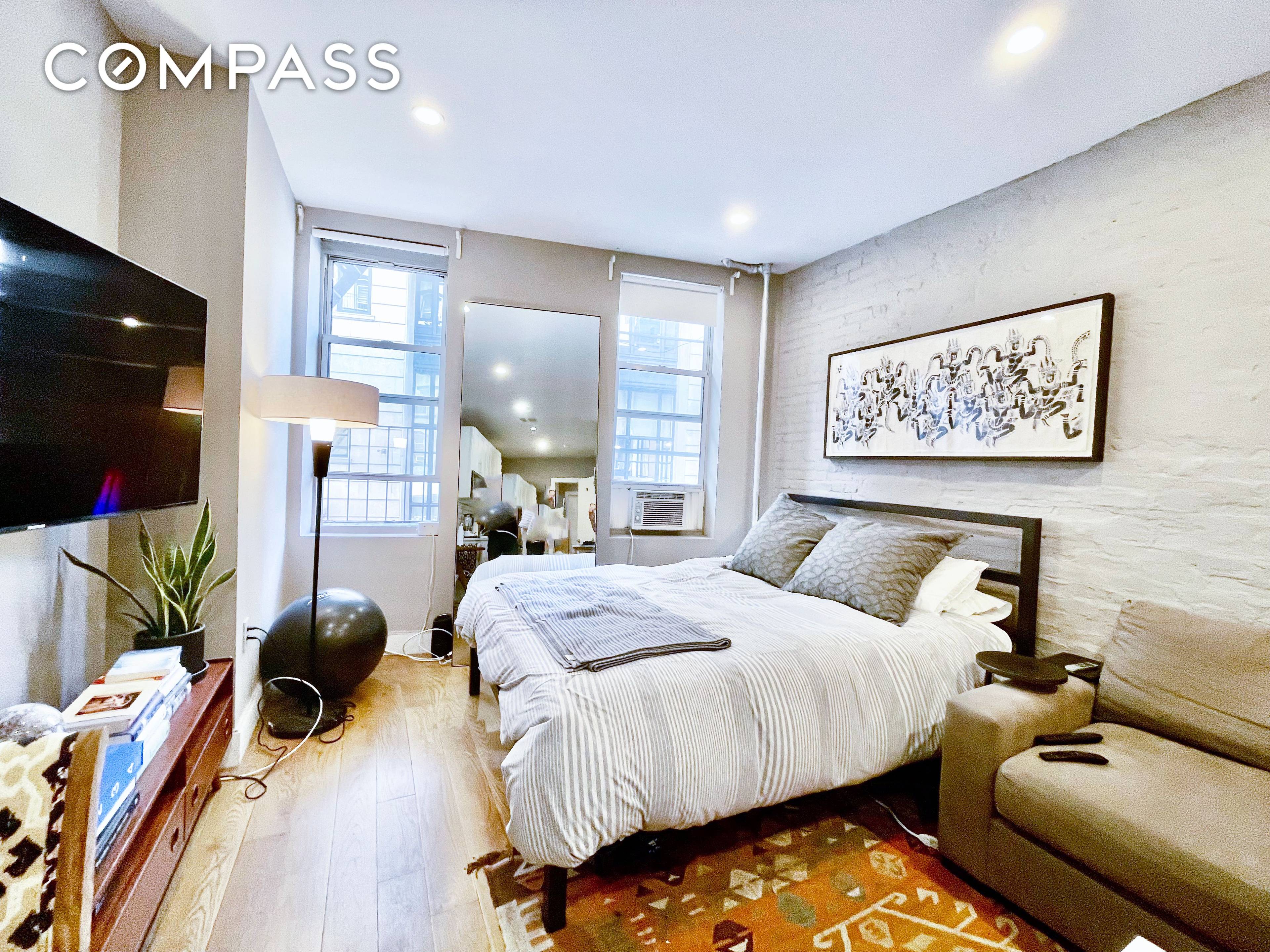 Prime Nolita SoHo Renovated Studio Home Office with W D in unit Renovated kitchen and stainless steel appliances.