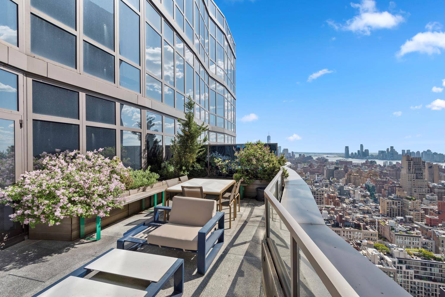 Entering this penthouse home you are immediately struck by the soaring 11 foot ceilings and jaw dropping views of Midtown and Hudson River through the floor to ceiling wall to ...