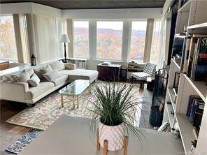 This stunning contemporary home with majestic views of the Housatonic River is graciously furnished and maintains the best of original midcentury modern flare blended with luxurious contemporary comforts and amenities.
