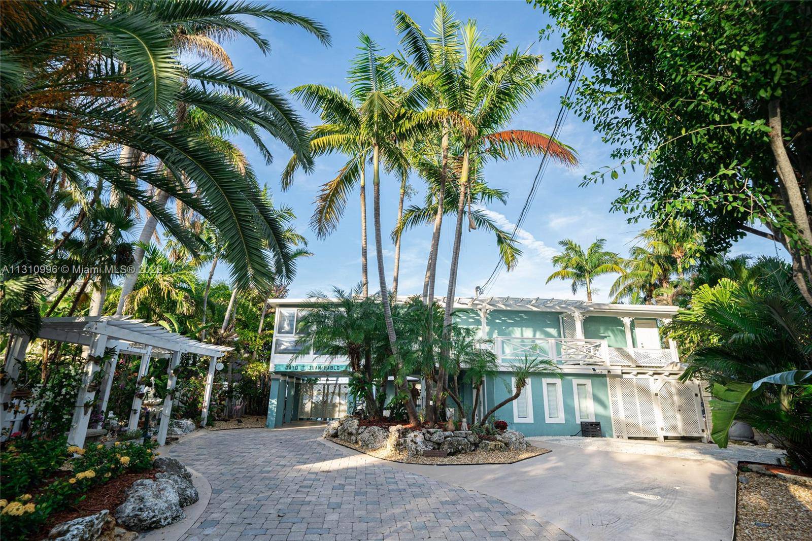BAYFRONT DREAM ! This newly remodeled, spacious, island style home offers the privacy and relaxation, of FL Keys living.