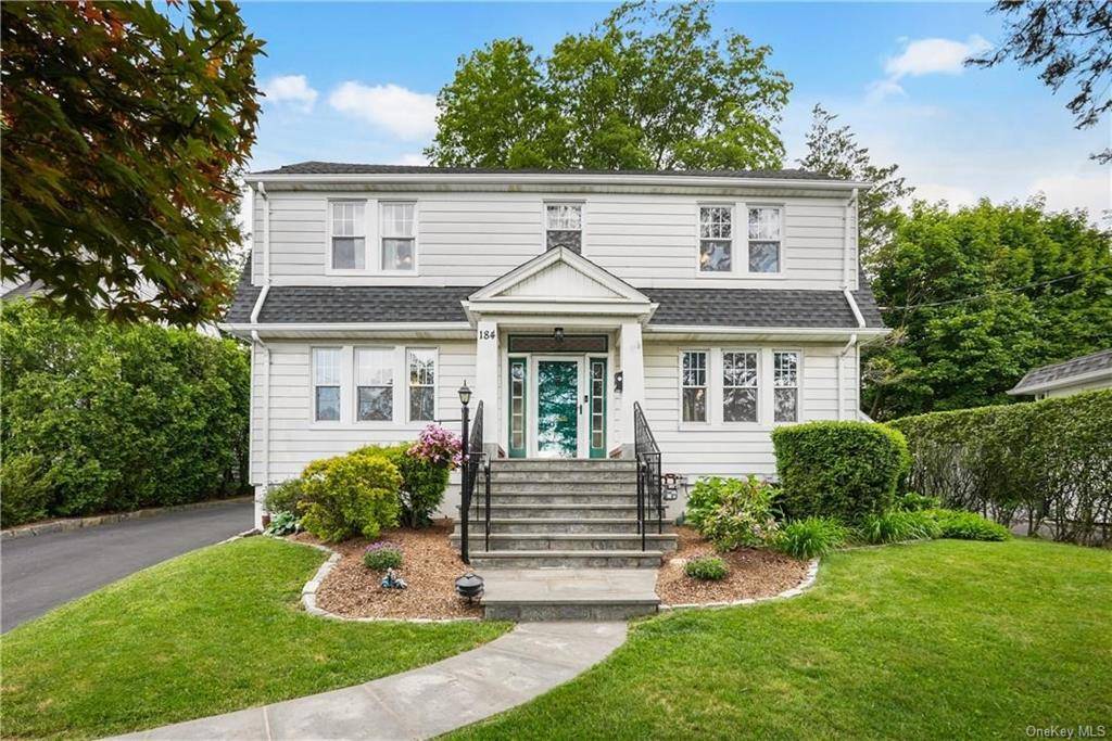 Beautiful sunny Colonial in the highlands with beautiful 3 large side bedrooms, large living room with working fireplace, adjacent to an office room or extra bedroom, formal dinning room, new ...