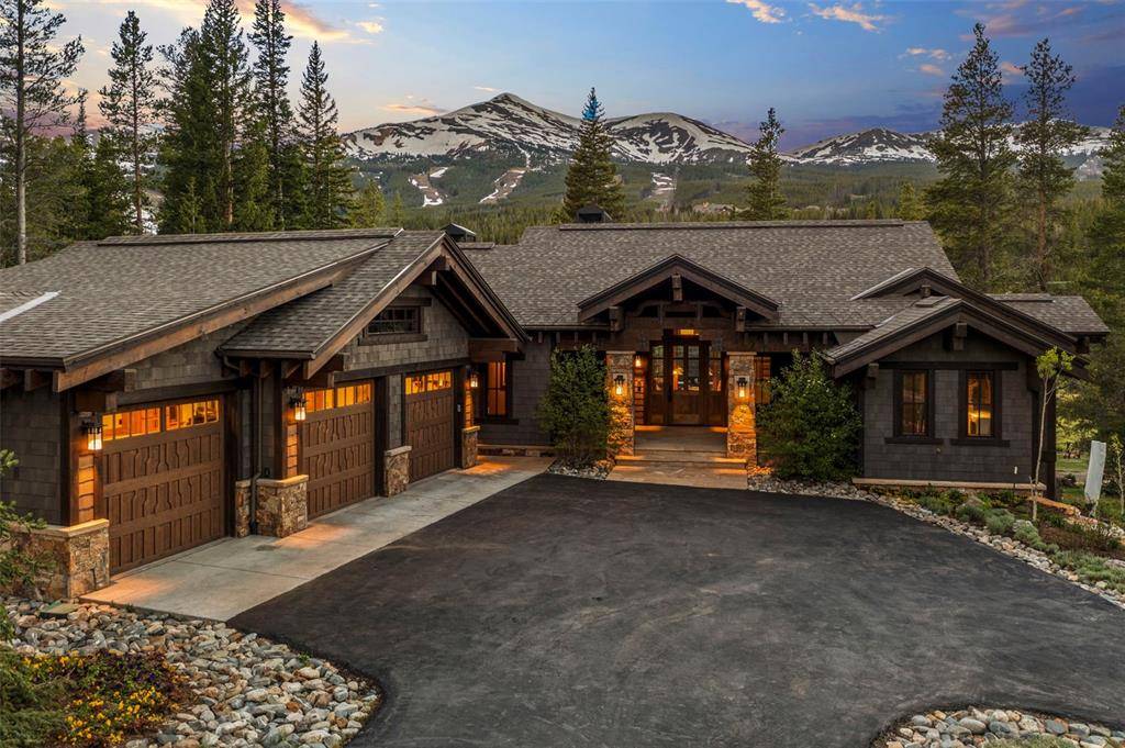 Elegantly situated Shock Hill masterpiece located in a secluded setting overlooking the protected Open Space of Cucumber Gulch.