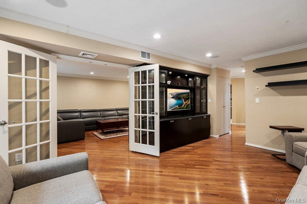 Living Room through double door entry to Den