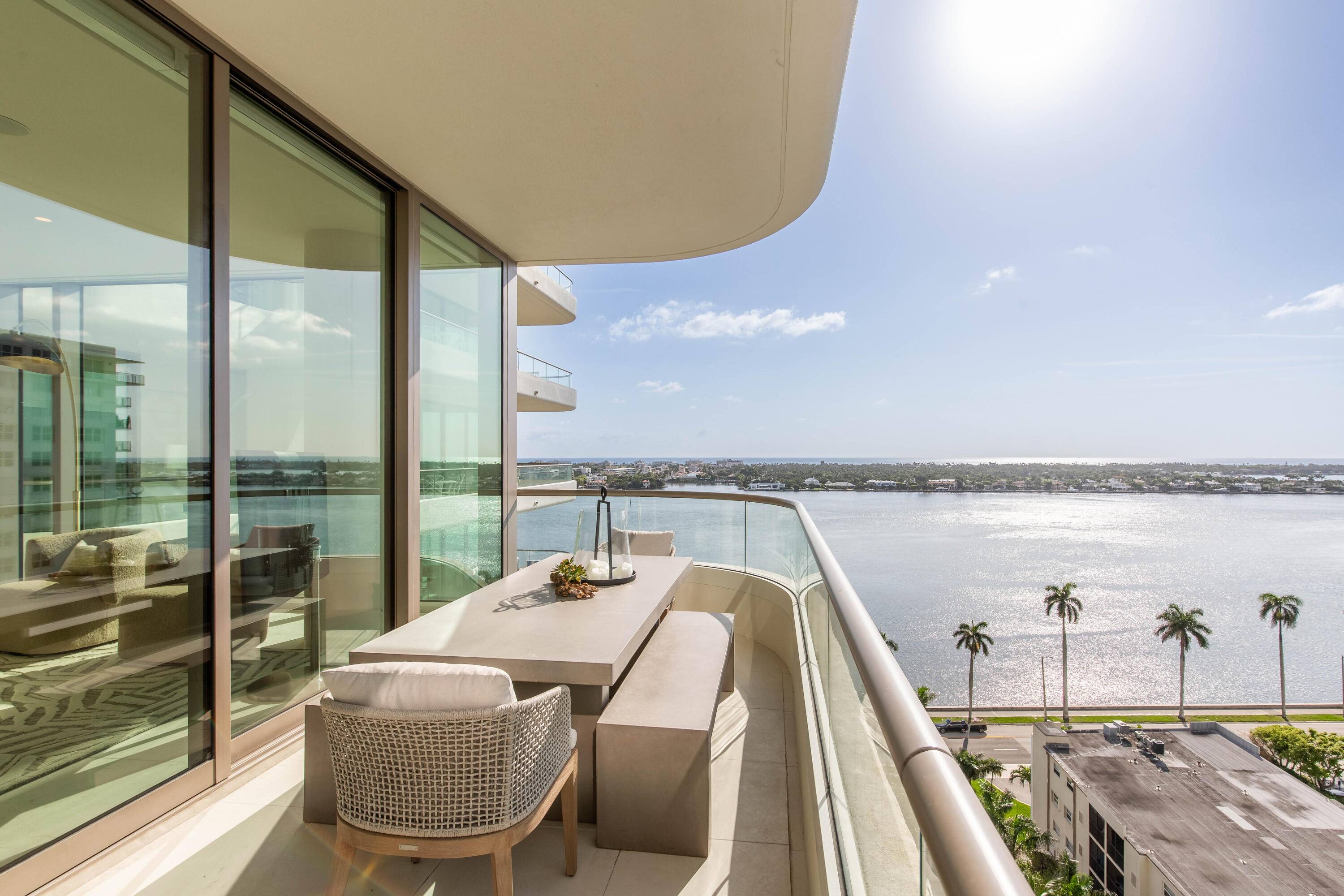 Discover luxury living on the 11th floor of La Clara Palm Beach, where modern organic design meets breathtaking water views.