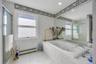 Bathroom with tub and shower