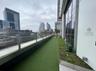 Balcony featuring a skyline view