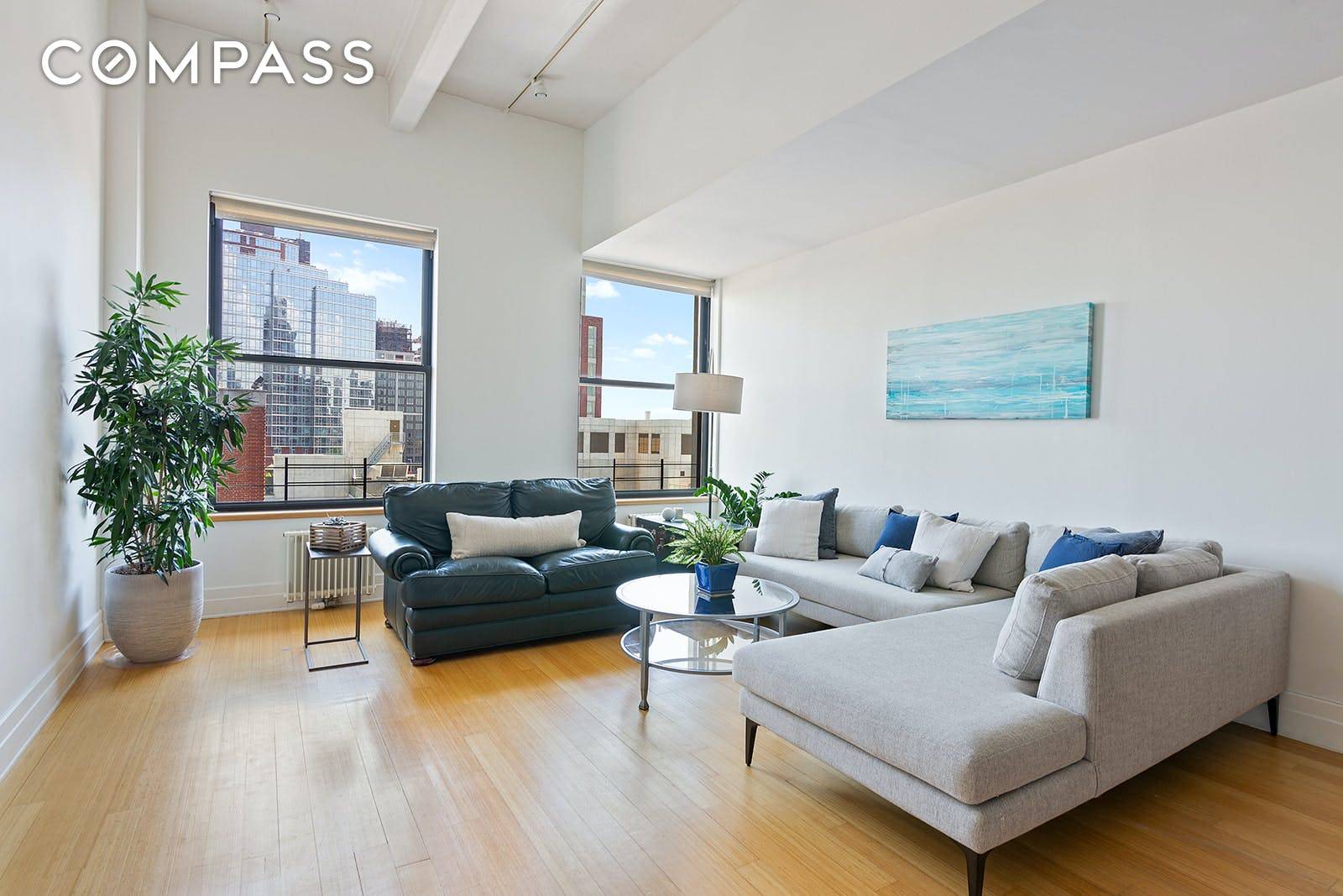 Residence 12T at 70 Washington Street is a chic and spacious loft with a home office in one of DUMBOs most coveted buildings.