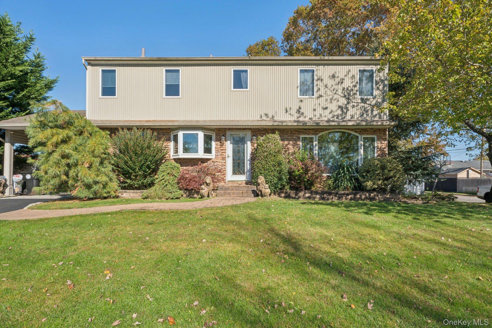 Large Colonial with all oversized Rooms, 4 Bedrooms with 3 Full Baths, Primary has Full Bath, 1 Year new Hardwood Flooring upstairs, Professional Landsacping, Large Recreation area located in Basement.