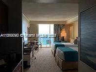 Trump International Condominium Hotel unit with direct ocean views This Oceanfront property has resortamenities such as pools, restaurants, beachside service, meeting rooms and ballroom, and spa services.