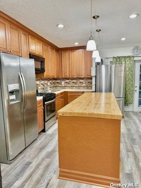Fully Renovated Kitchen With New Stainless Steel Appliances, Huge Island.