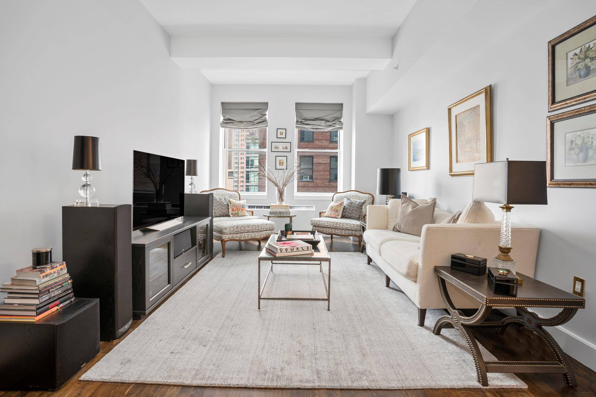 Fabulous, spacious, renovated 1, 056 sq ft Tribeca condo, featuring one bedroom, one bathroom, 10 ft beamed ceilings, brand new hardwood floors, fully built out closets, home office area, and ...