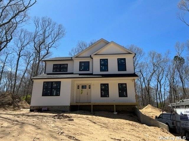 New Construction Beautiful four bedroom on secluded just shy acre lot.