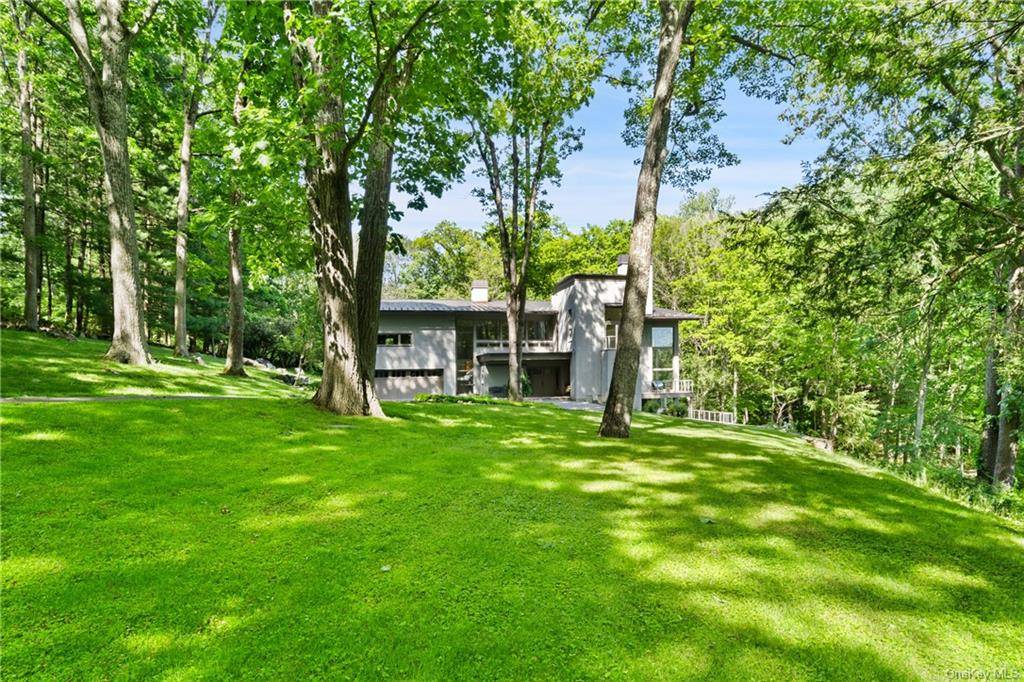 Welcome to your picturesque and dream rental, with breathtaking falling waters overlooking the rushing Mill River and one of the Twin Ponds.