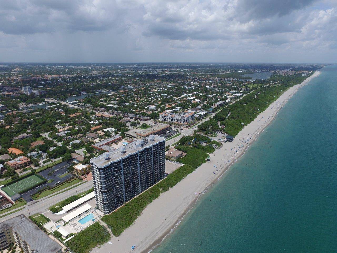 Model perfect and contemporary seasonal rental with direct ocean views and fabulous city and views of Lake Boca.
