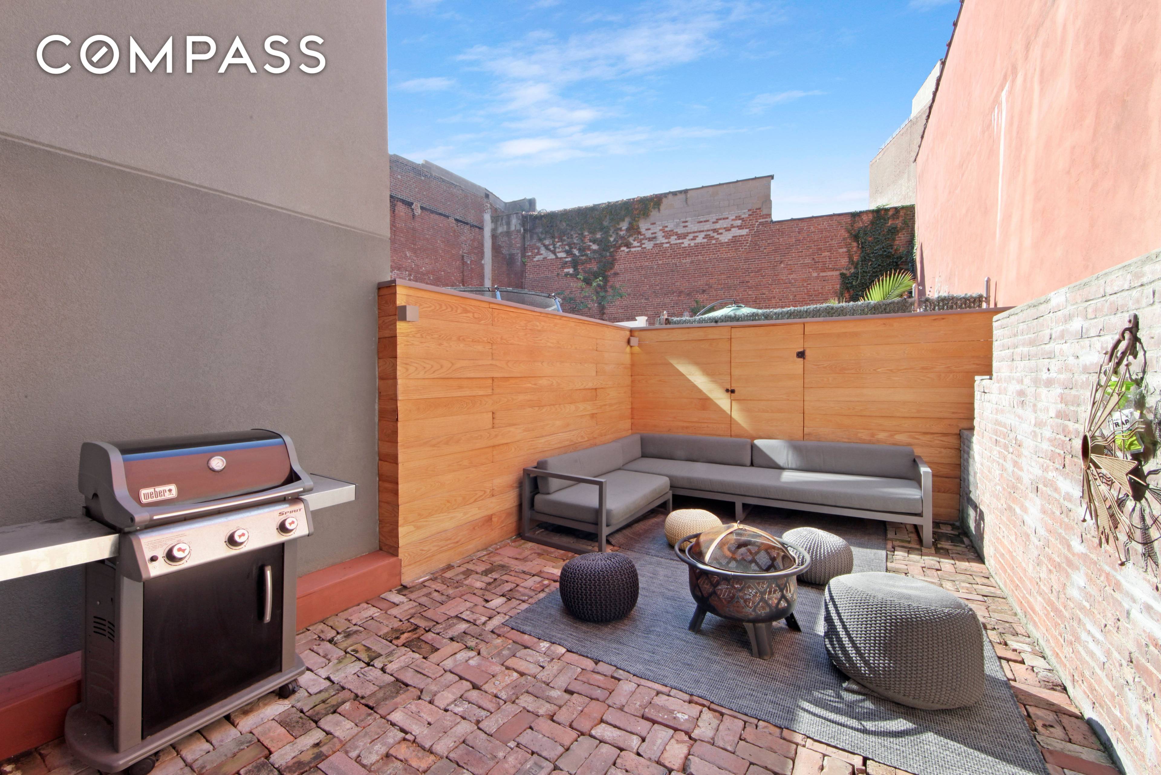 Loft 1C offers soaring double height ceiling height of nearly 17 feet, Southern exposed floor to ceiling windows, steel stairs railings, original exposed brick and a private backyard.