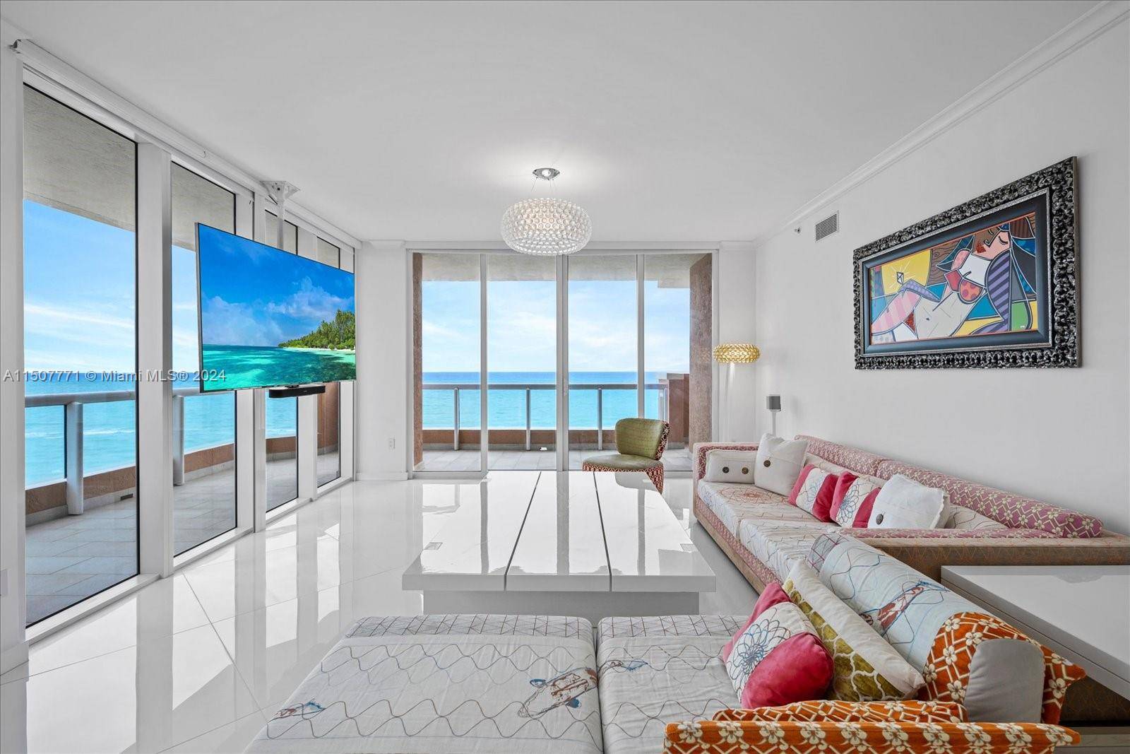 Spectacular oceanfront corner residence, completely upgraded with the most spectacular modern finishes and furnishings.