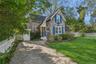 View of front of house featuring roof with shingles