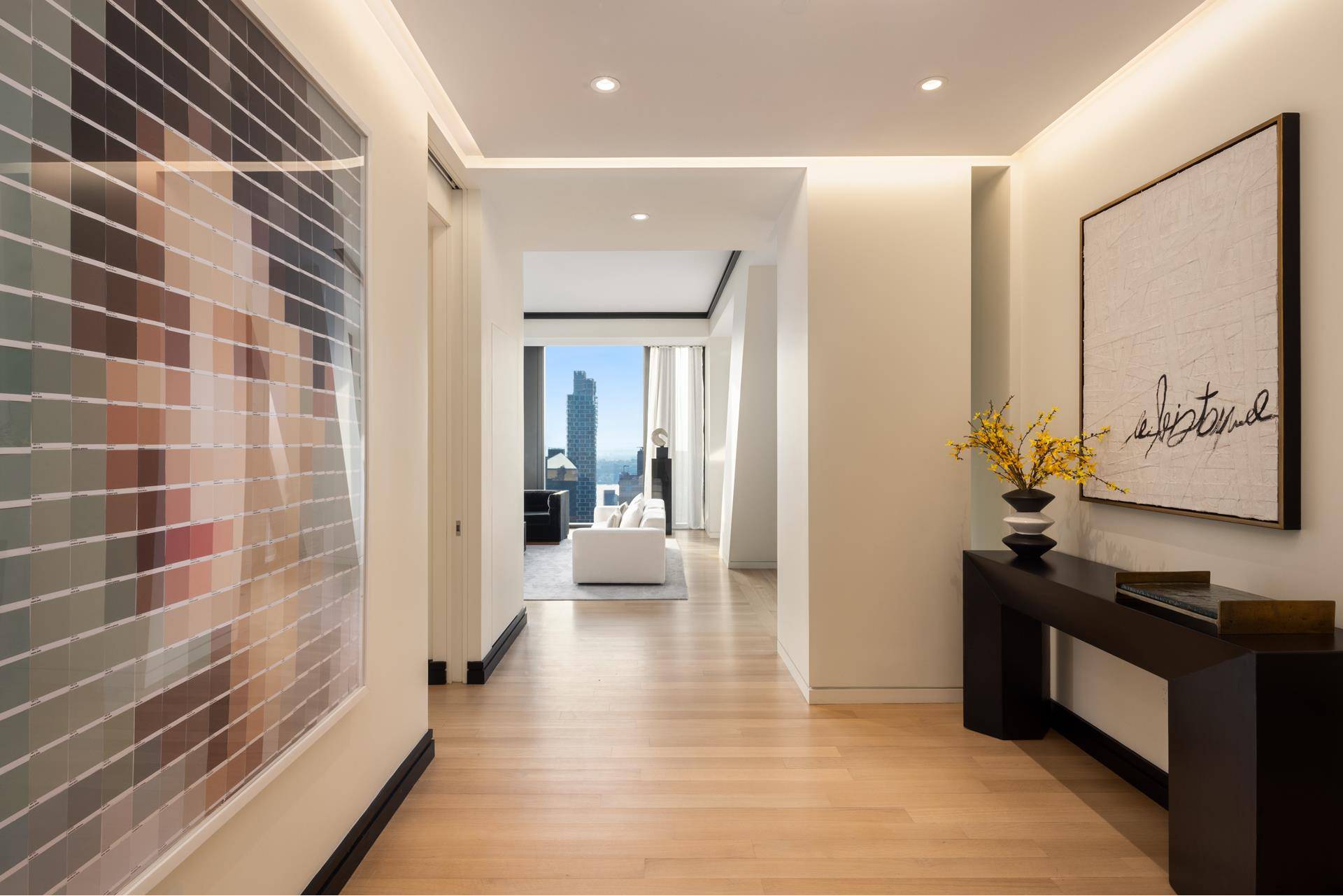 Balancing grand scale living with the intimate feeling of home, Residence 60B at 53 West 53 comprises 3, 132 square feet, offering three bedrooms, three and a half bathrooms, and ...