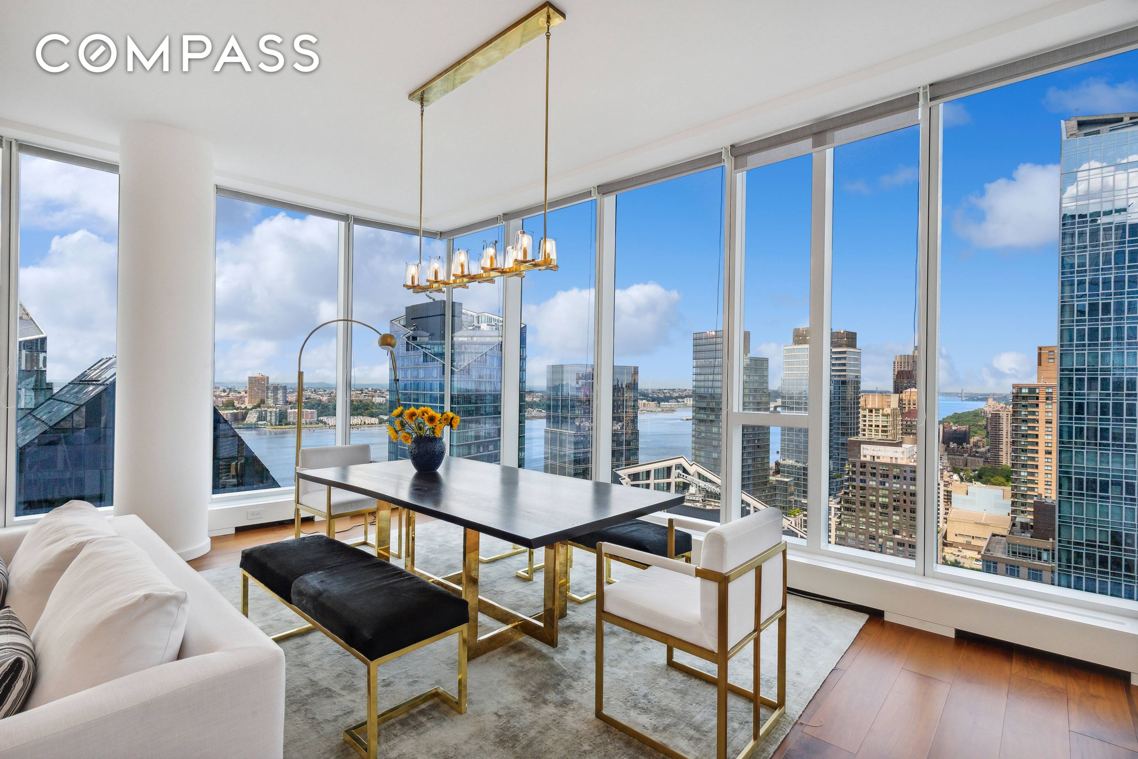 Welcome to this flawlessly designed, high floor corner three bedroom, three and a half bath residence in the heart of Manhattan, where luxury living awaits.