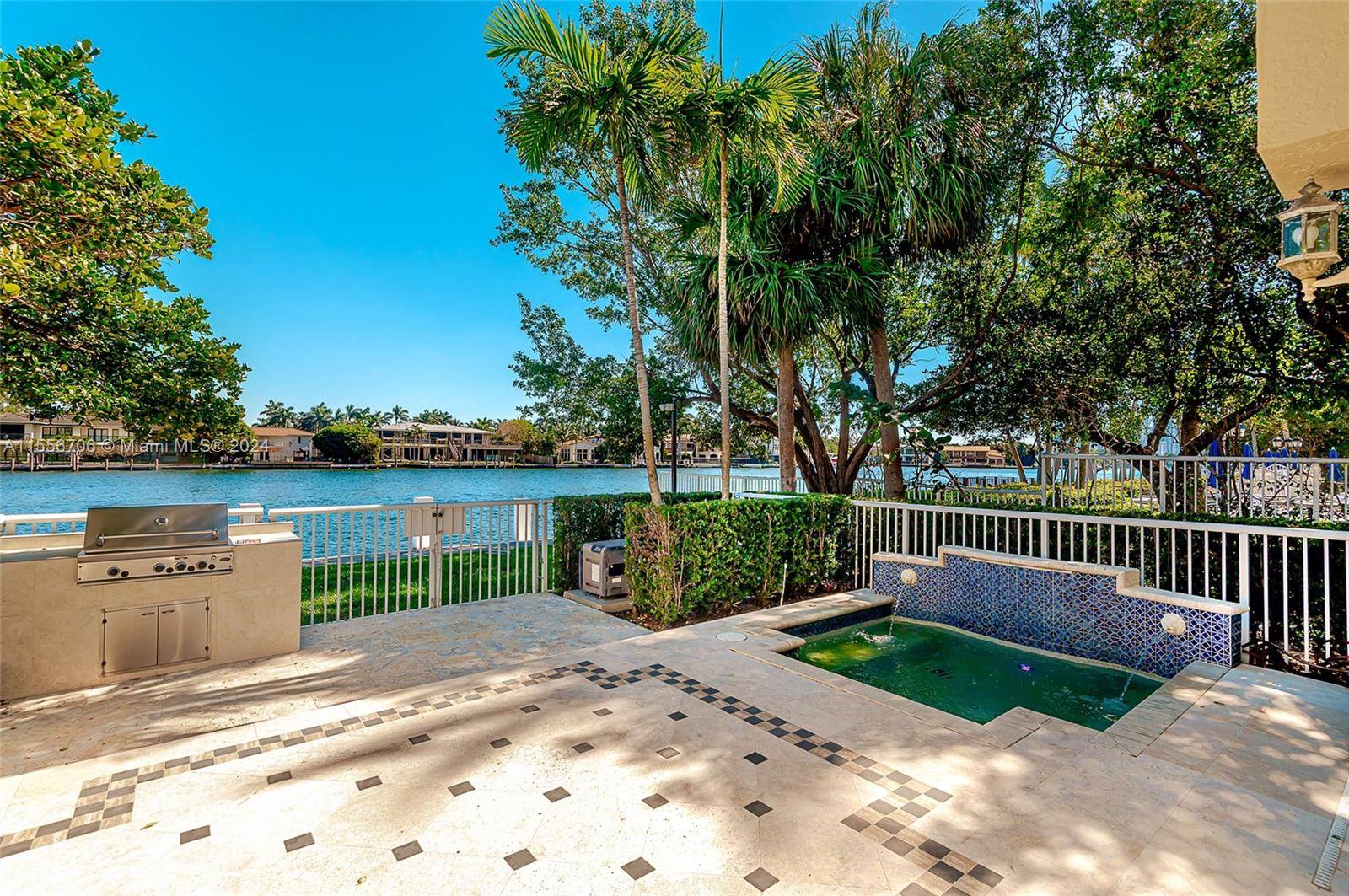 Corner unit, directly on the Intracoastal waterway with fantastic views, deeded boat dock, the unit has the largest driveway that can fit at least 8 cars plus 2 car garage.