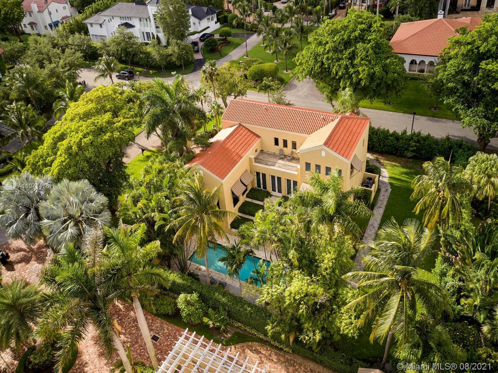 This elegant Mediterranean style home sits in a cul de sac on a corner lot in Islands of Cocoplum, one of Coral Gable s most exclusive GATED communities.