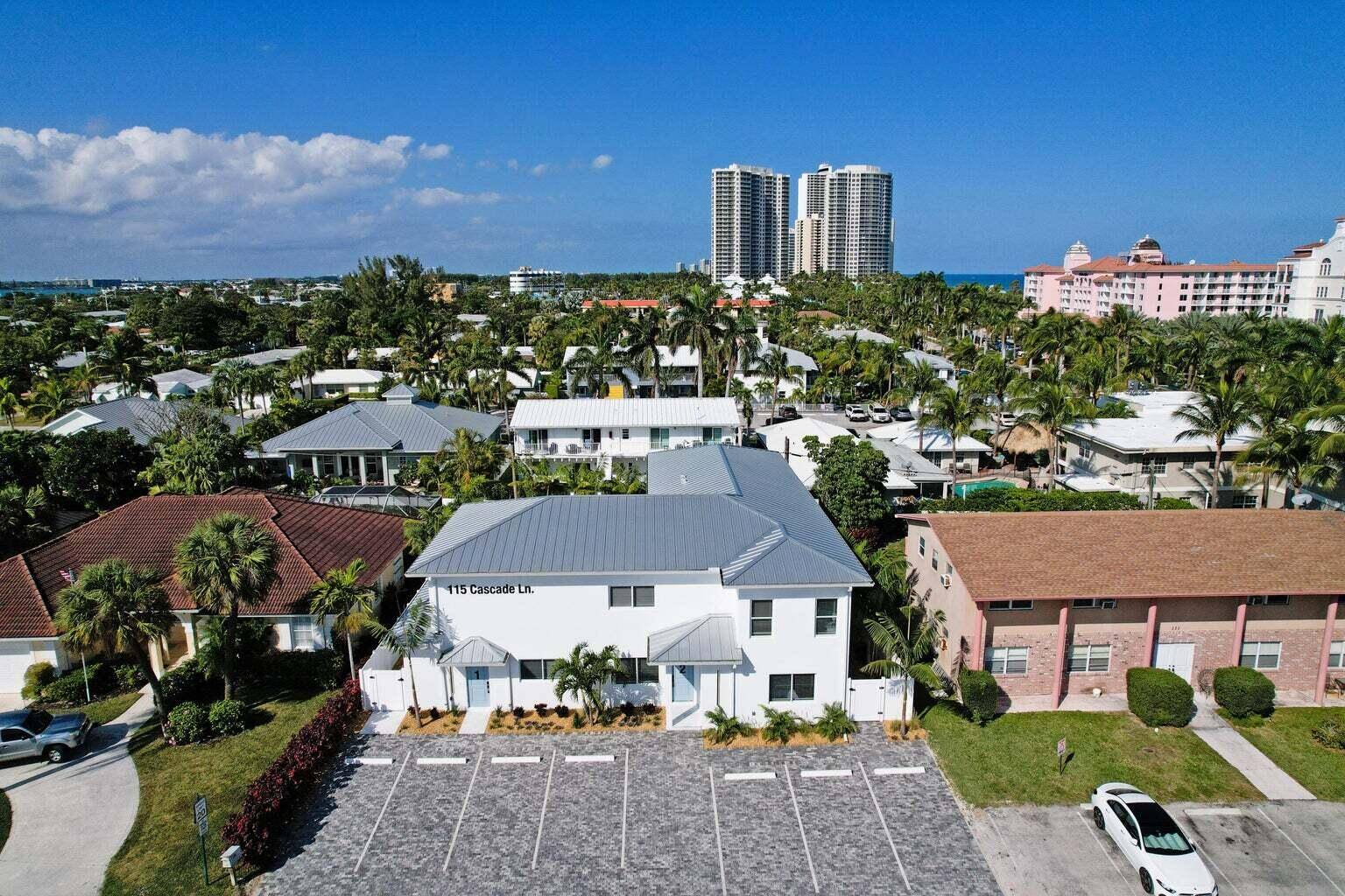 SEASIDE ELEGANCE IN PALM BEACH SHORES A RARE MULTIFAMILY GEM JUST STEPS FROM THE BEACH.