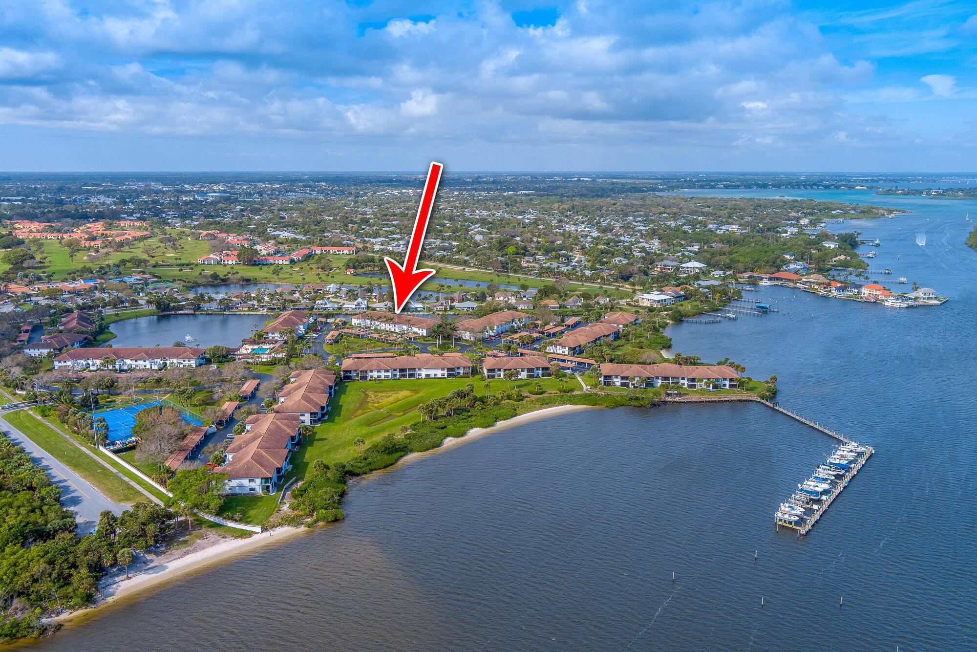 Discover waterfront living at its finest in this beautifully updated ground floor condo nestled in the picturesque community of Hanson's Landing between Miles Grant and the Intracoastal Waterway.