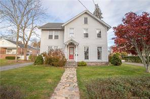 Spacious 4 bedroom antique colonial home located in a historic New England village setting.