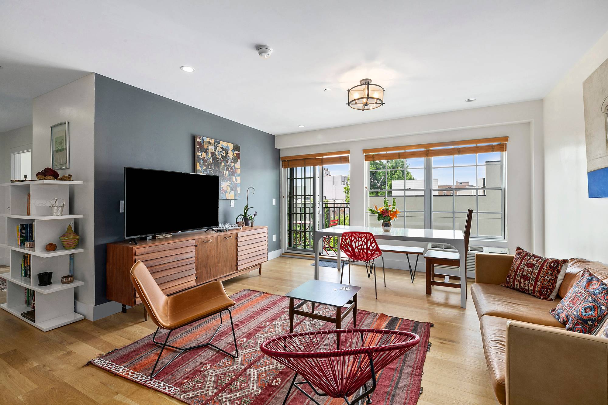 Be among the first to live in this well thought out two bedroom, one bathroom condo that's flooded with natural light and features two south facing balconies.