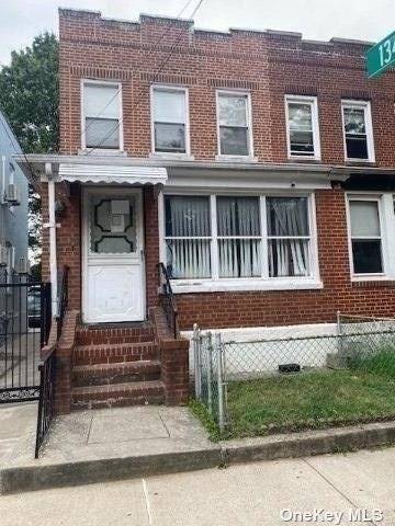 Legal two family with hardwood floors on first floor, basement, second floor carpet wall to wall.