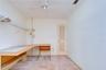 Private office with closet offering bedroom flexibility.