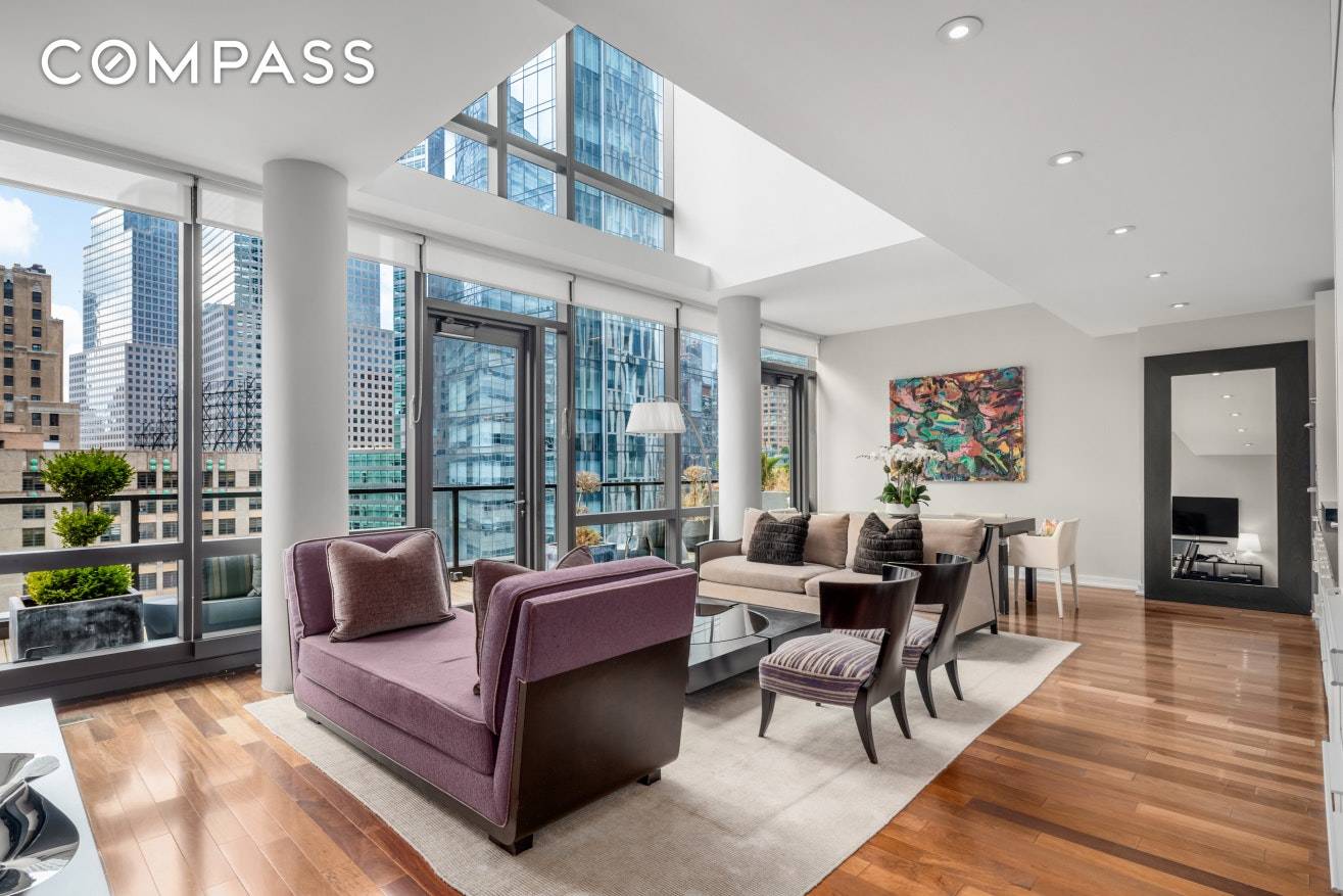 Residence 11D is a dramatic duplex with an open balcony spanning over 320 square feet and is found in one of TriBeCa s most sought after condominiums.