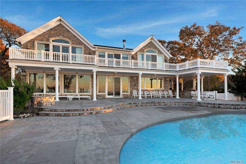 Extraordinary waterfront oasis with saltwater pool amp ; private dock.