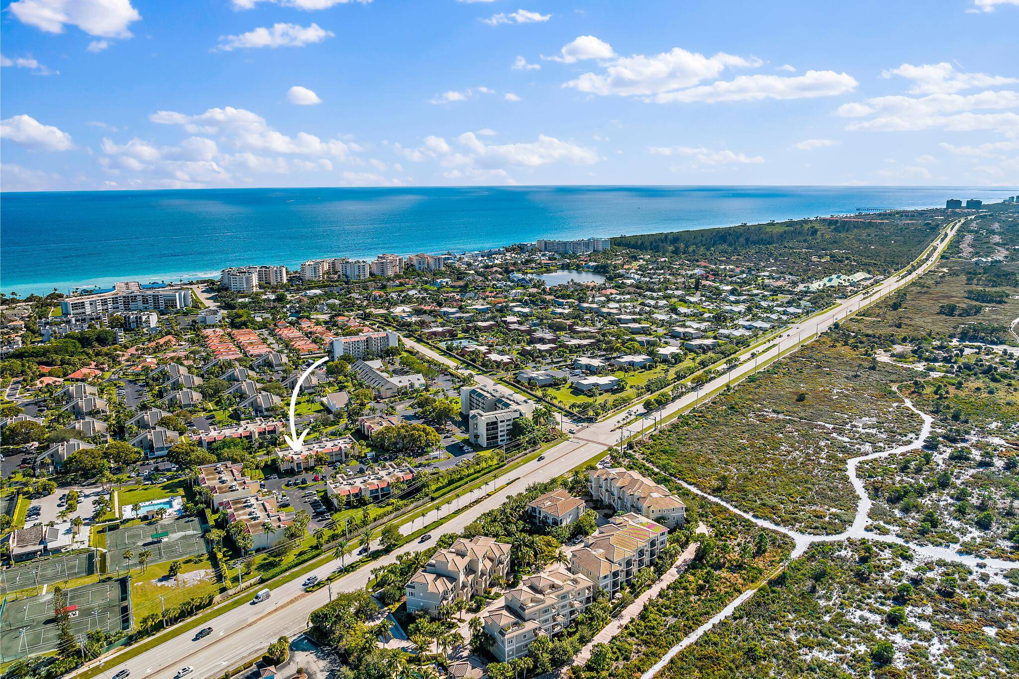 Own a Slice of 33477 Paradise in Jupiter Ocean and Racquet Club.
