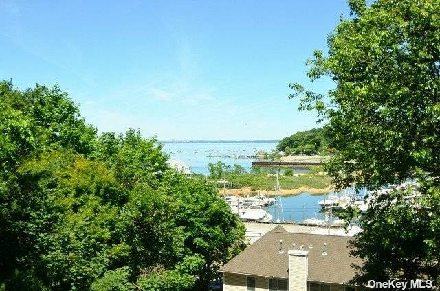 Gorgeous Townhouse Apartment Overlooking Hempstead Harbor With Magnificent Views.