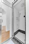 Upper level full bathroom with separate standing shower with full body spa nozzels