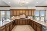 Kitchen— gas range, windows