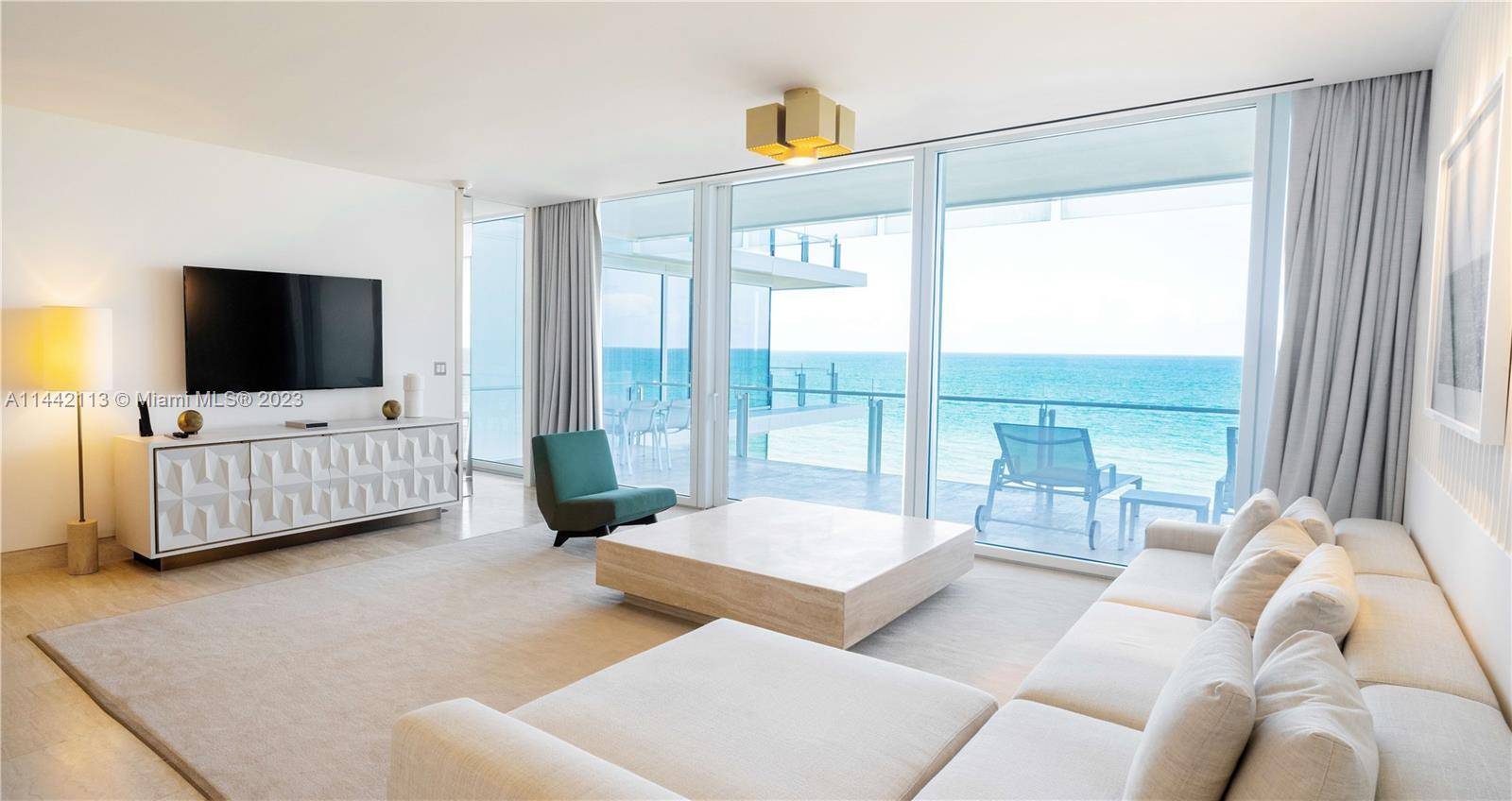 Enjoy FOUR SEASONS HOSPITALITY in this Corner 1 Bed Den, 2 Bath OCEAN FRONT Hotel Residence furnished by Parisian architect, Joseph Dirand.