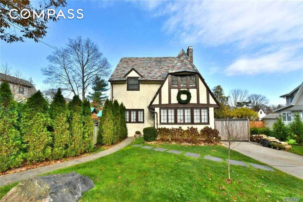 Beautifully updated mid block Tudor on an oversized lot with room for further expansion in the heart of Douglaston Manor.