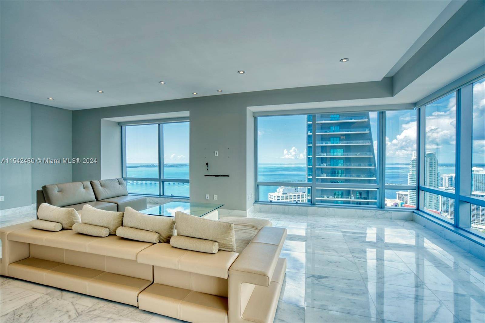 This renovated upgraded corner residence on the 46th floor offers stunning bay, ocean and city views as far as the eye can see.