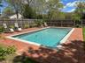 View of swimming pool with a patio area and a fenced backyard